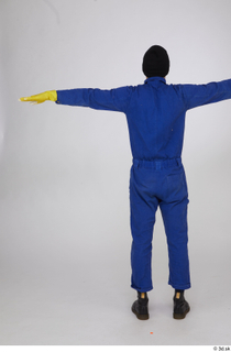 Photos Shawn Jacobs Painter in Blue Coveralls standing t poses…